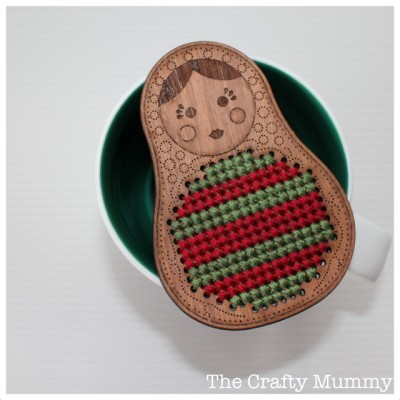 cross stitch on timber babushka