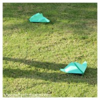paper planes grass green