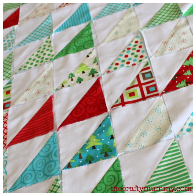 Christmas triangles quilt - Part of planning a quilt using half square triangles is deciding how to arrange them. There are so many options! Which would you pick?