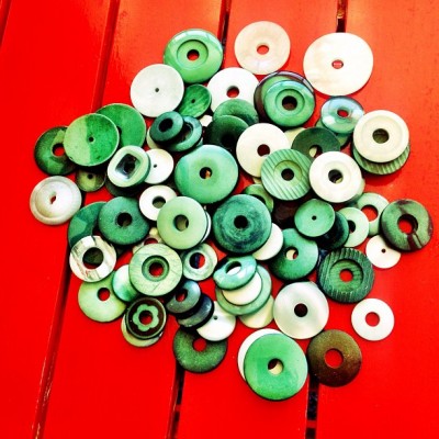 green buttons on red chair