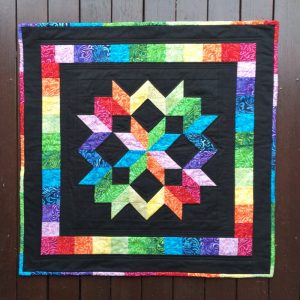 rainbow star mini quilt finished
